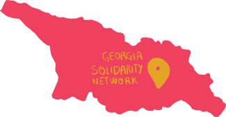 This image is a close-up of Georgia in coral pink with a yellow pin indicating “Georgia Solidarity Network”
